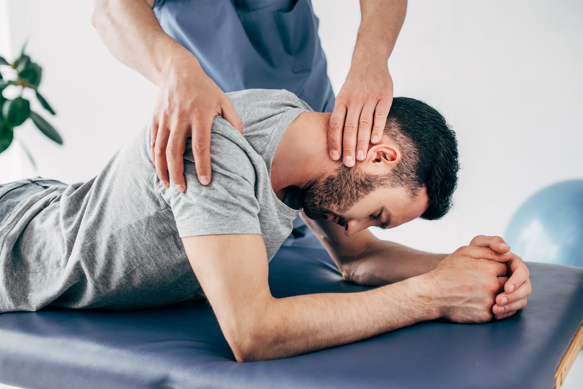Chiropractor And Male Patient